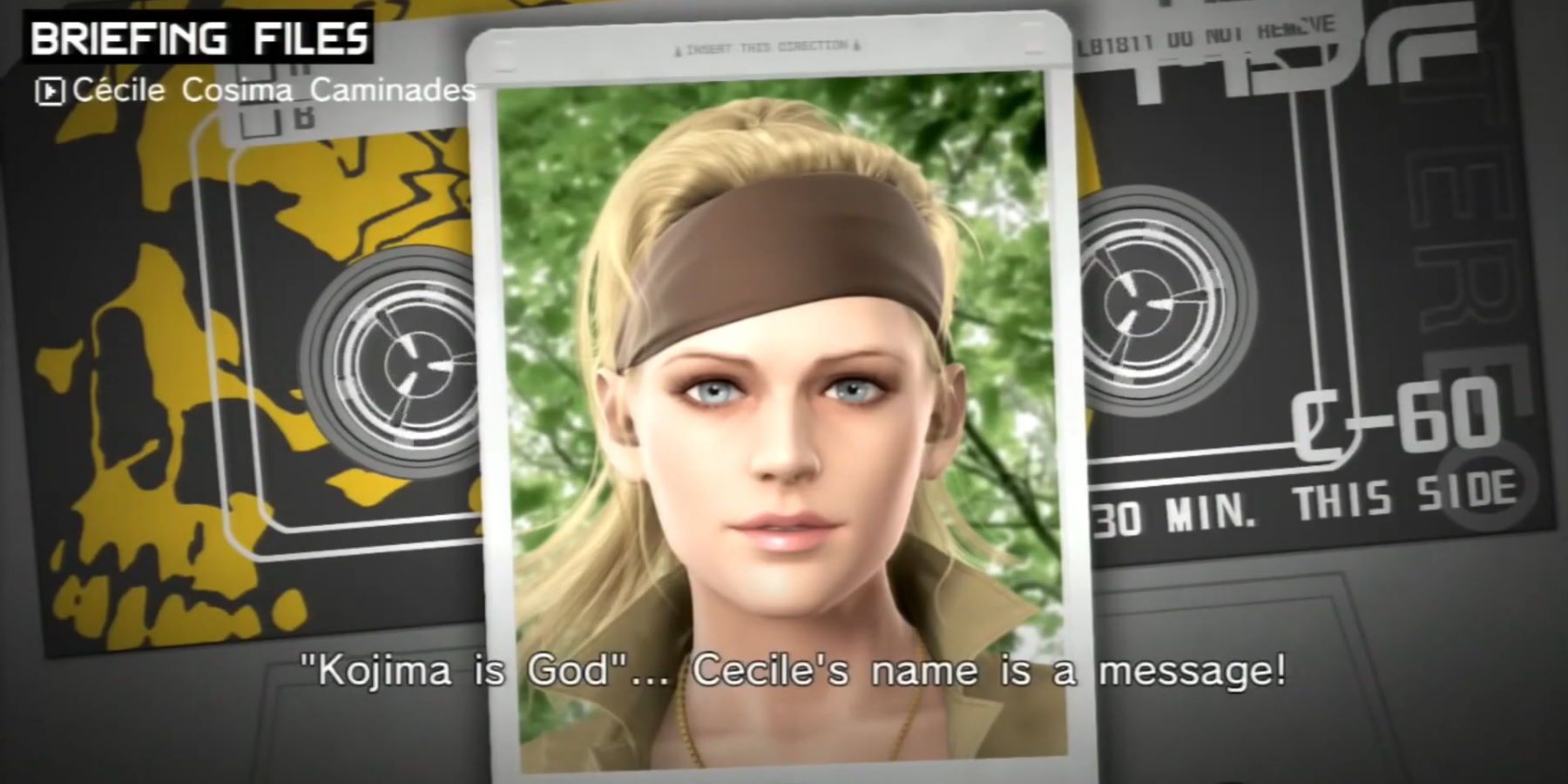 A tape with the MSF logo on it and a picture of Cecile Cosima Caminades in front. Subtitles say '"Kojima is God" ... Cecile's name is a message!"