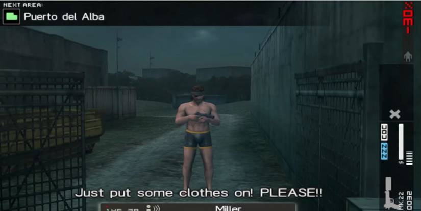 Snake, naked, and being berated by Kaz in an abandoned factory at night