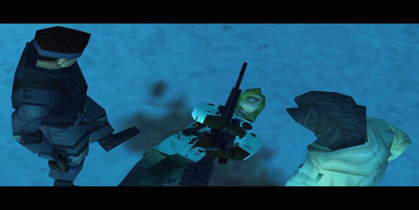 Sniper Wolf covered in blood and laying in the snow, holding her gun. Otacon and Snake are nearby