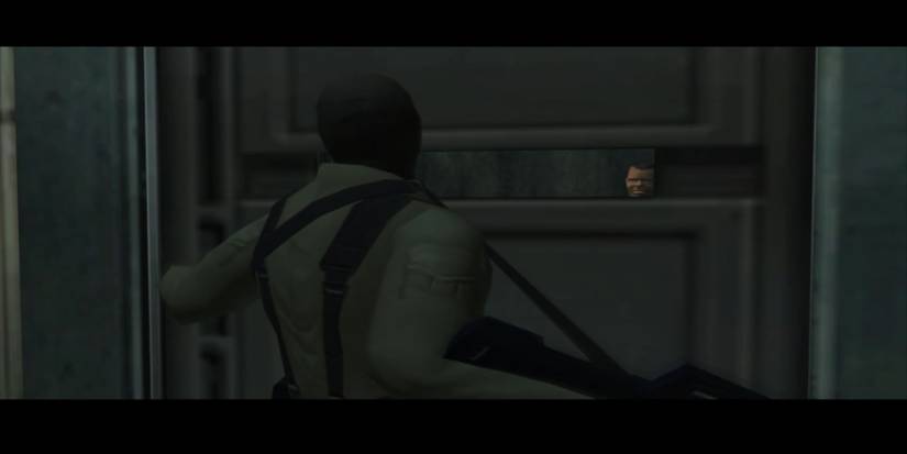 Johnny Shrugging at the DARPA chief inside his cell