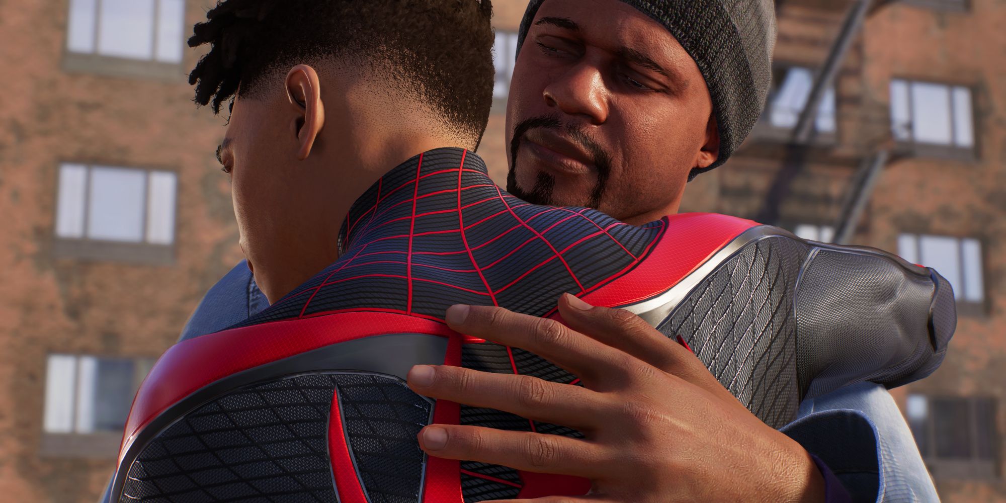 Miles hugging Uncle Aaron in Marvel's Spider-Man 2