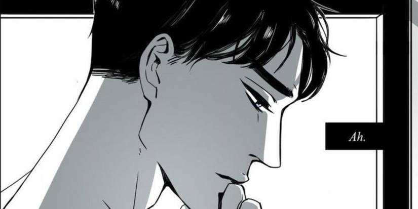 a man puts his hand on his chin