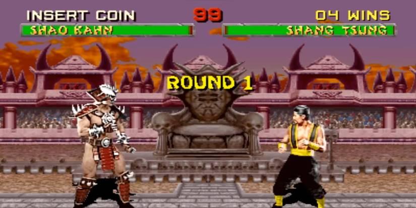 Shang Tsung Versus Shao Kahn in a colliseum, near a throne and while a crowd watches