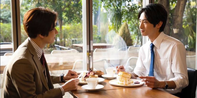 two men have dessert together