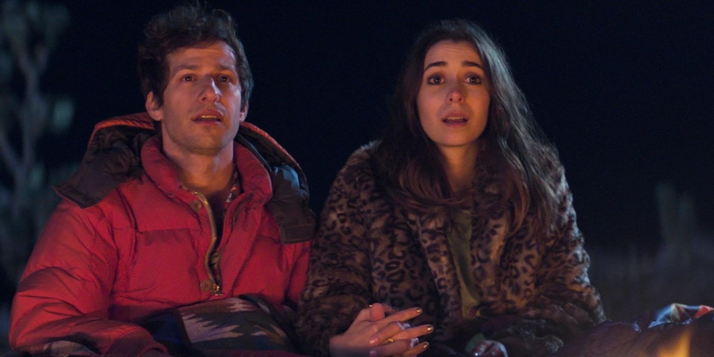 Andy Samberg and Cristin Milioti stare off into the distance