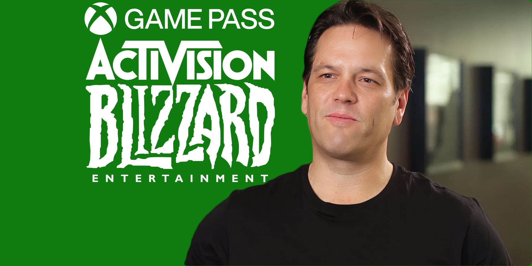 Phil Spencer in front of Xbox Game Pass Activision Blizzard logos