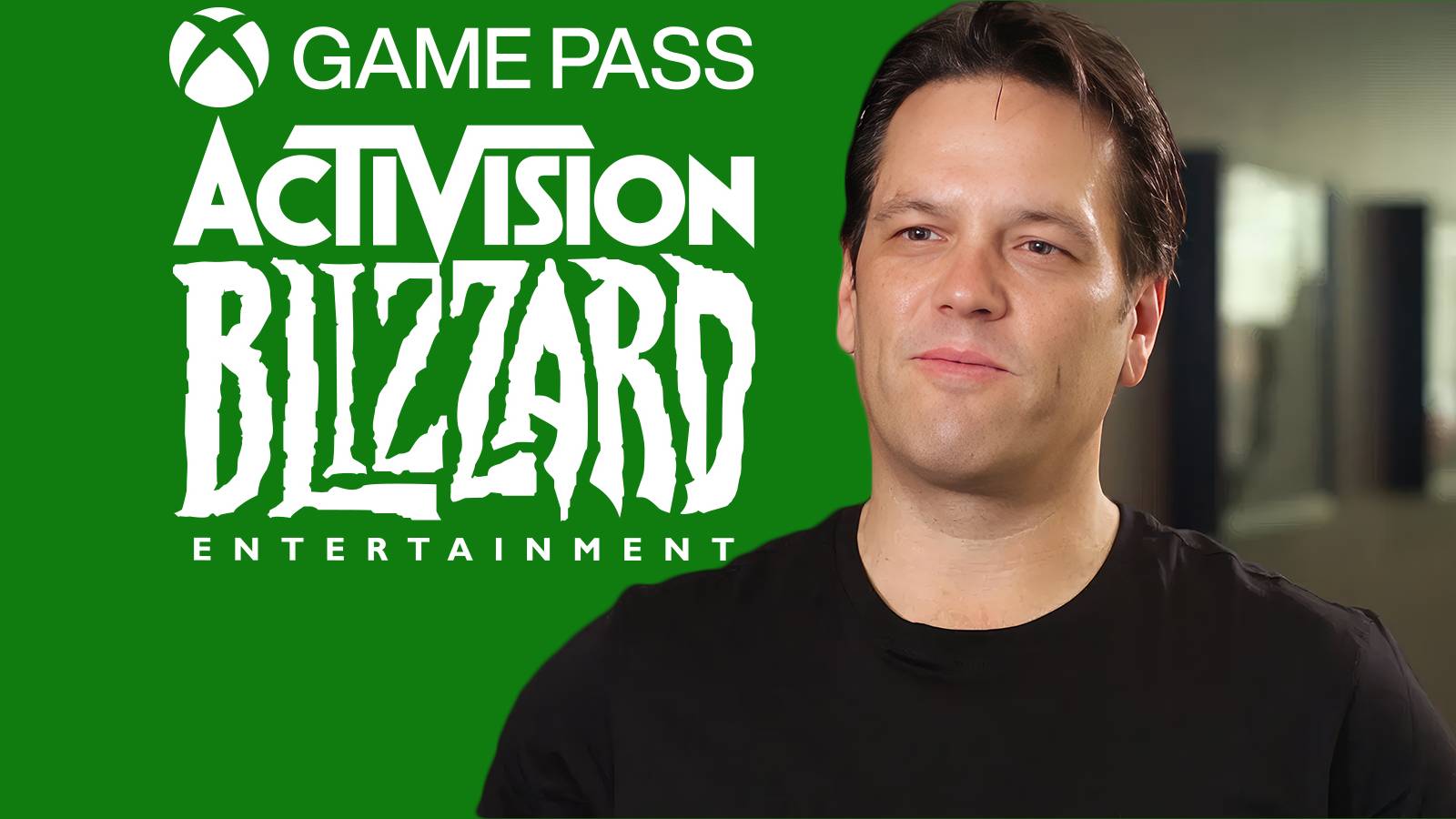 Phil Spencer in front of Xbox Game Pass Activision Blizzard logos