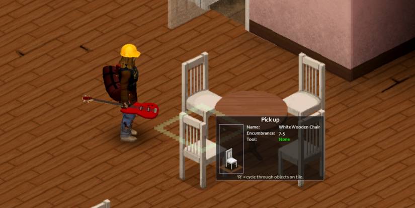 Project Zomboid player looking at a White Wooden Chair ready to pick it up