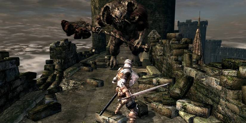 Player Facing Down A Giant Beast In Dark Soul's: Remastered