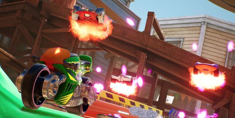 Bike And Cars racing Around A Mini Golf Course