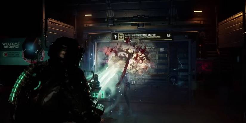 Isaac Shooting A Necromorph With The Contact Beam