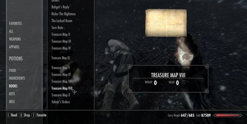 A player in their inventory in Skyrim