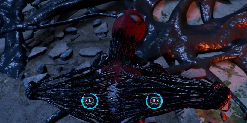 spider-man rips the symbiote off of his suit