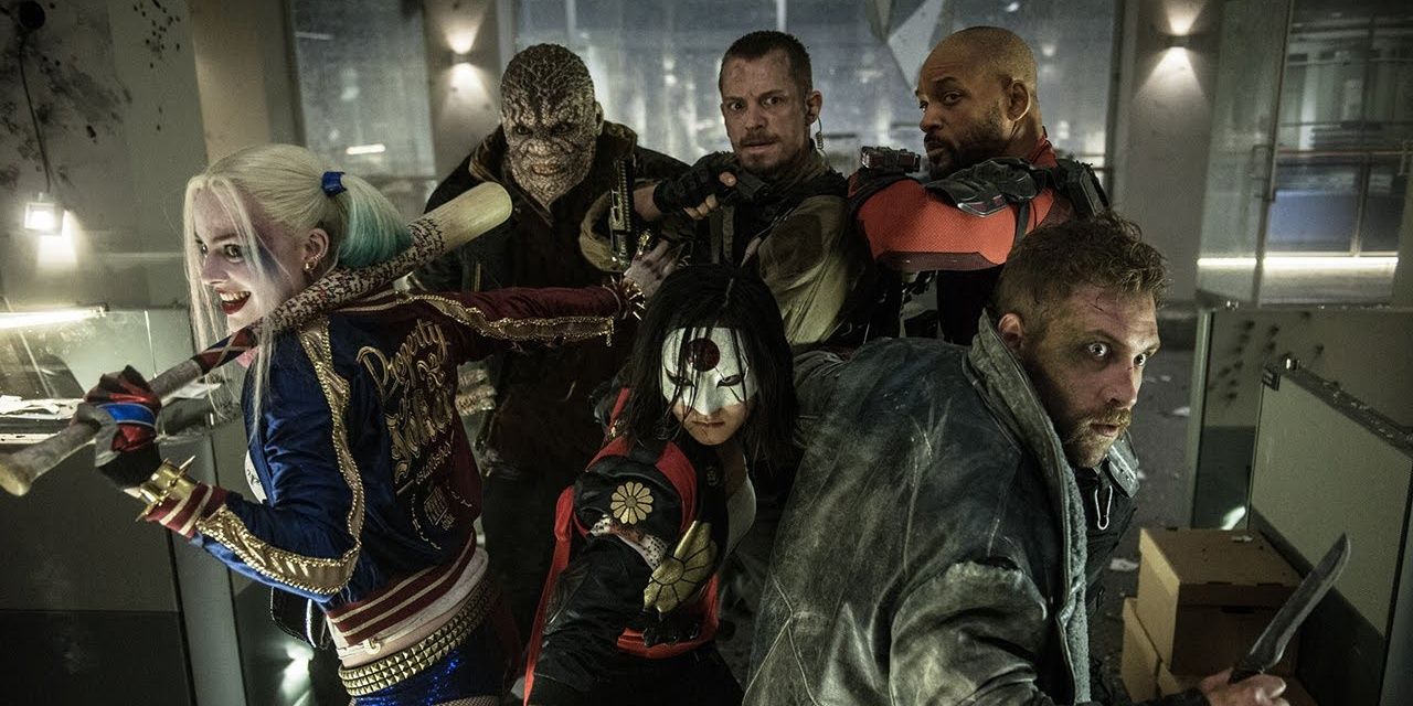 An image of Harley Quinn and some other villains being surrounded