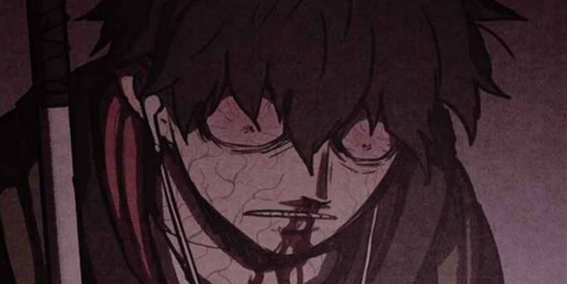 a boy with bloodshot eyes and a nose bleed