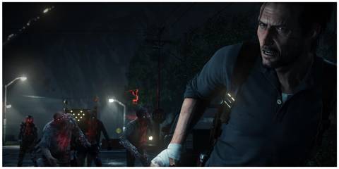 A terrified man running away from some zombies in the dark in The Evil Within 2