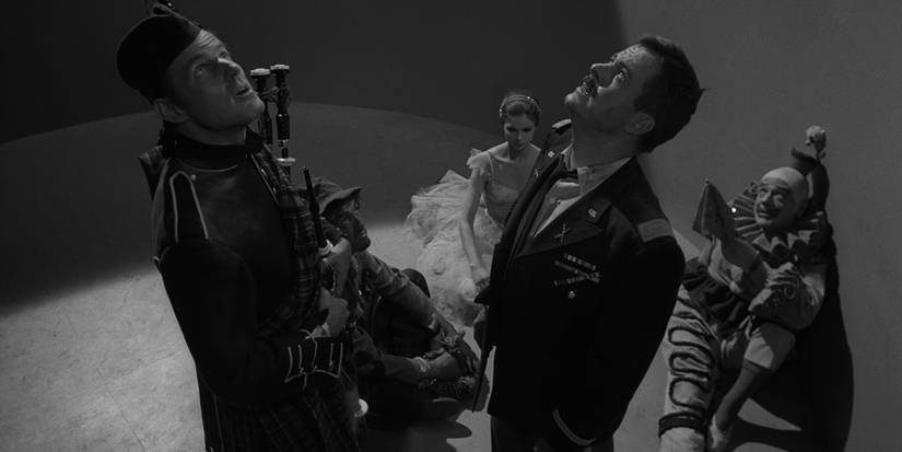 A group of people are trapped in a metal tube in The Twilight Zone's "Five Characters In Search Of An Exit".