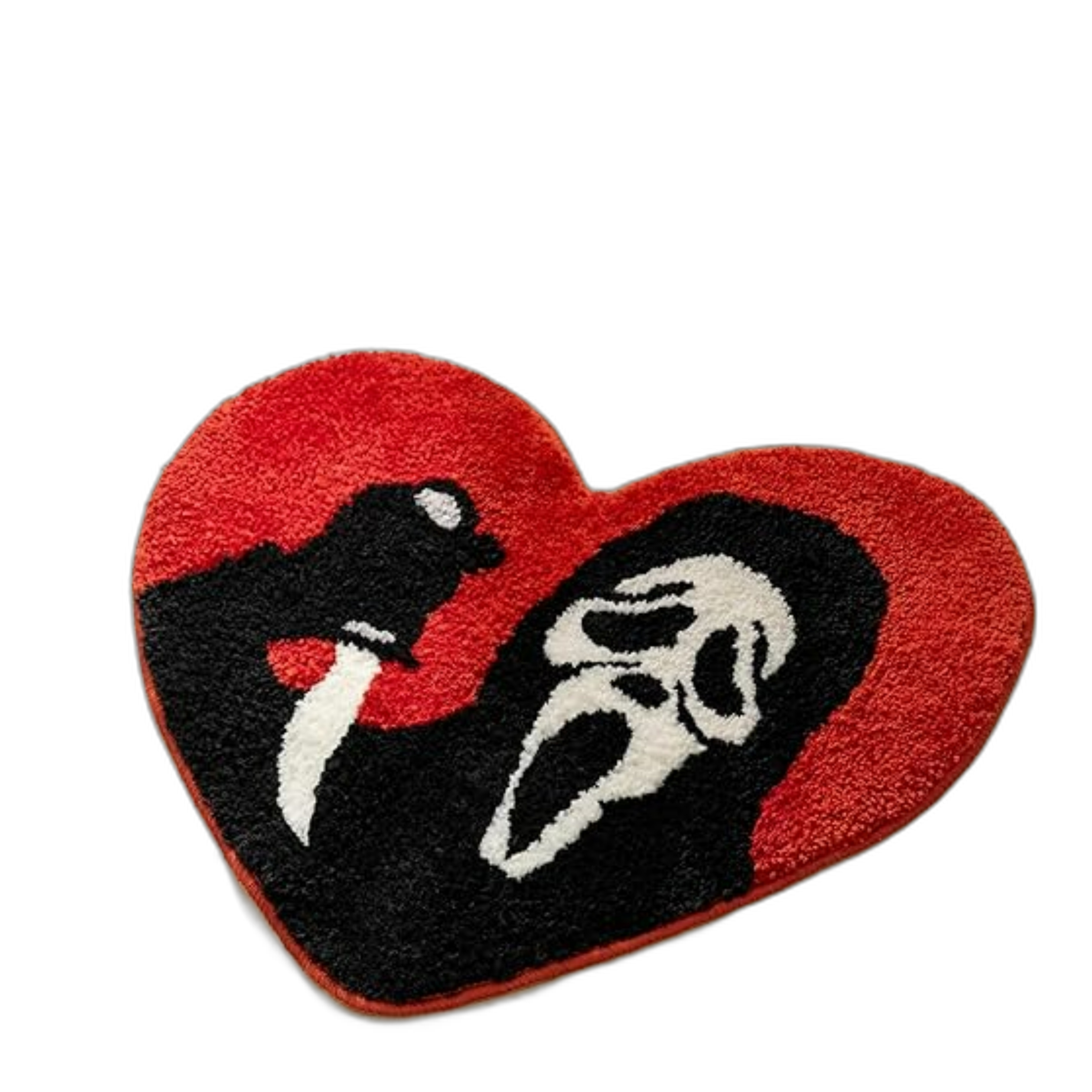 Red heart=shaped rug with a picture of ghostface, the killer from the Scream franchise.