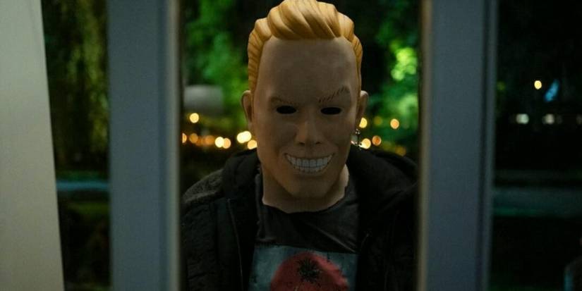 The Sweet 16 Killer wearing a mask in Totally Killer