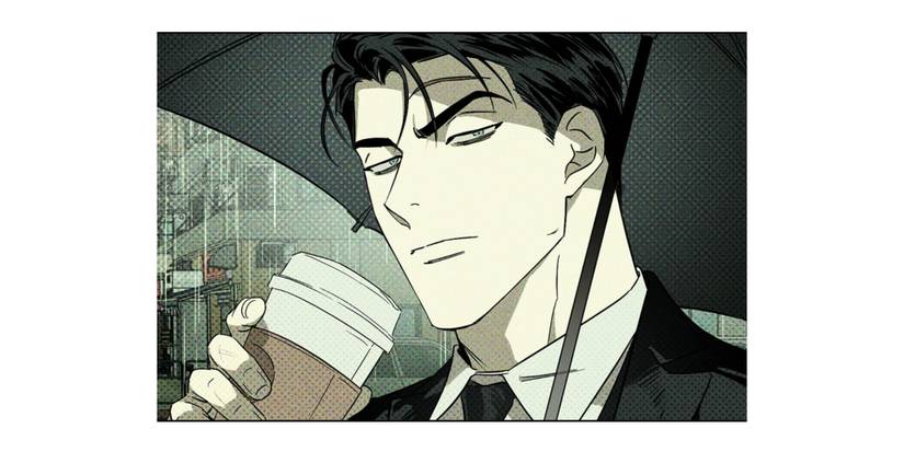 under the greenlight jin holds an umbrella and a coffee