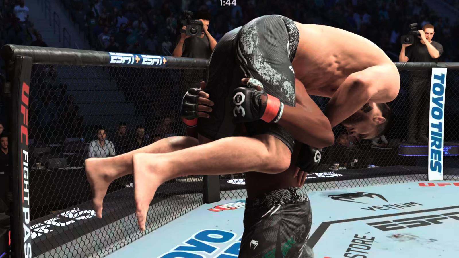 Usman picking up Till for the powerslam takedown