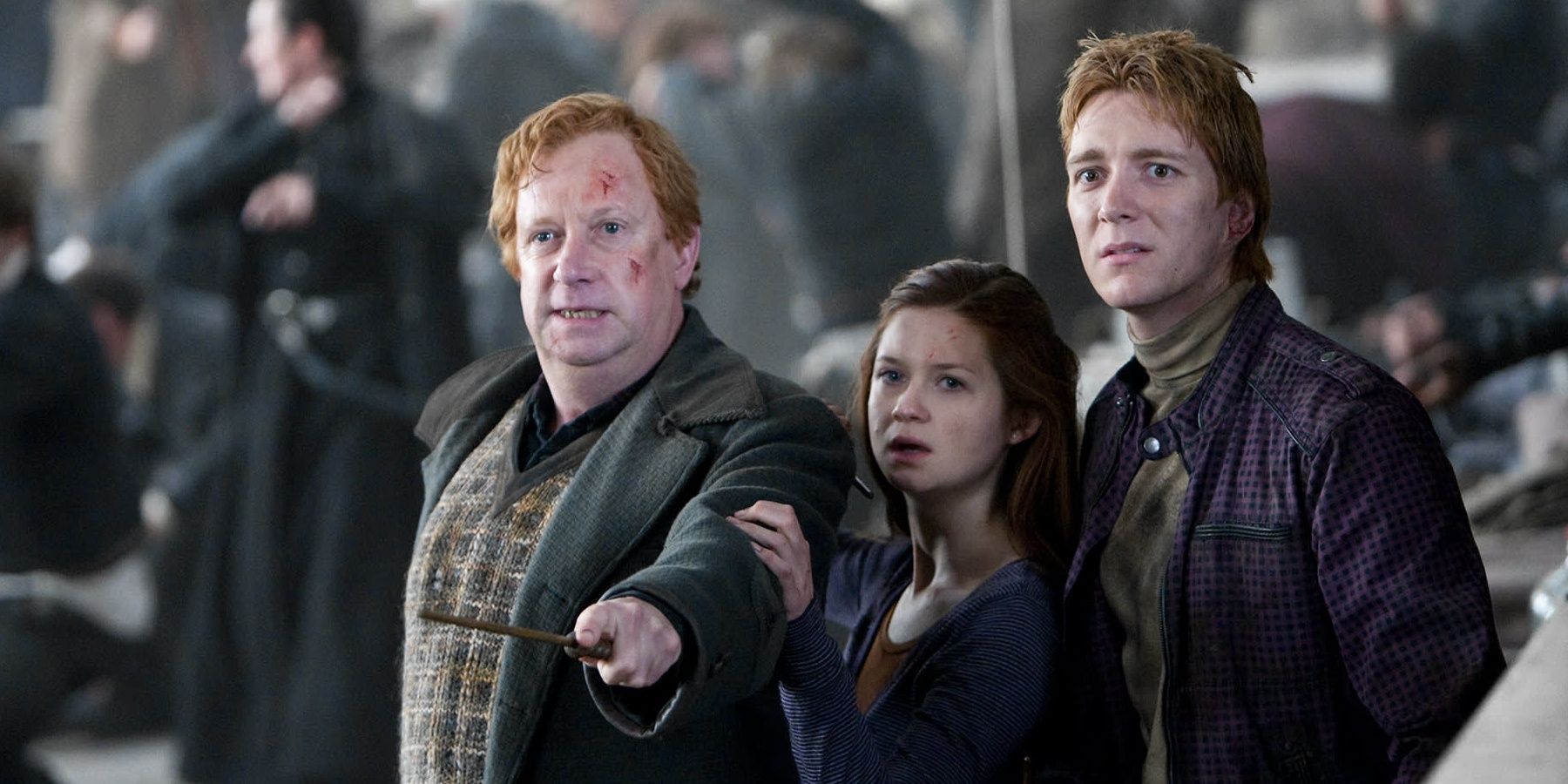 Arthut Weasley protects his son and daughter