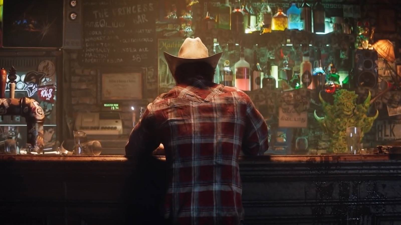 Wolvering sitting at a bar in a cowboy hat