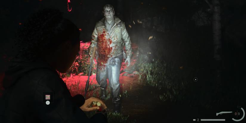 Saga reloading while a Taken enemy walks toward her