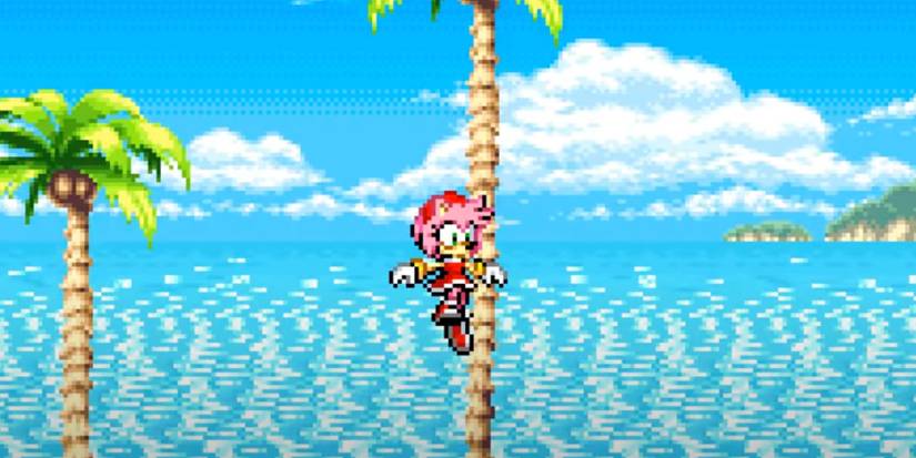 Sonic Advance's Amy falling through the air, with palm trees and the sea behind her