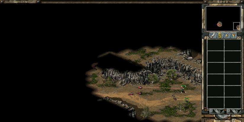 Troops attacking Nod enemies in a barren wasteland