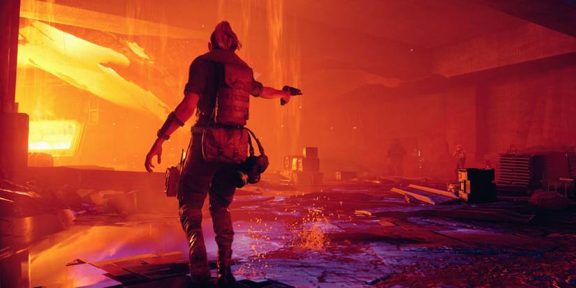 A player aiming their gun in Control