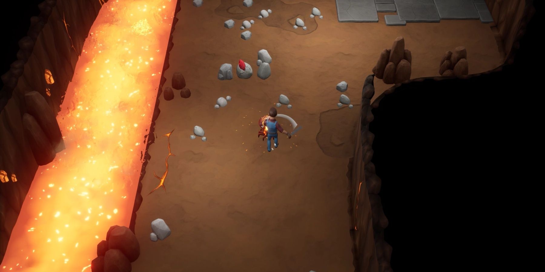 The player fighting a monster with a sword as a lava river flows next to them in the cavern
