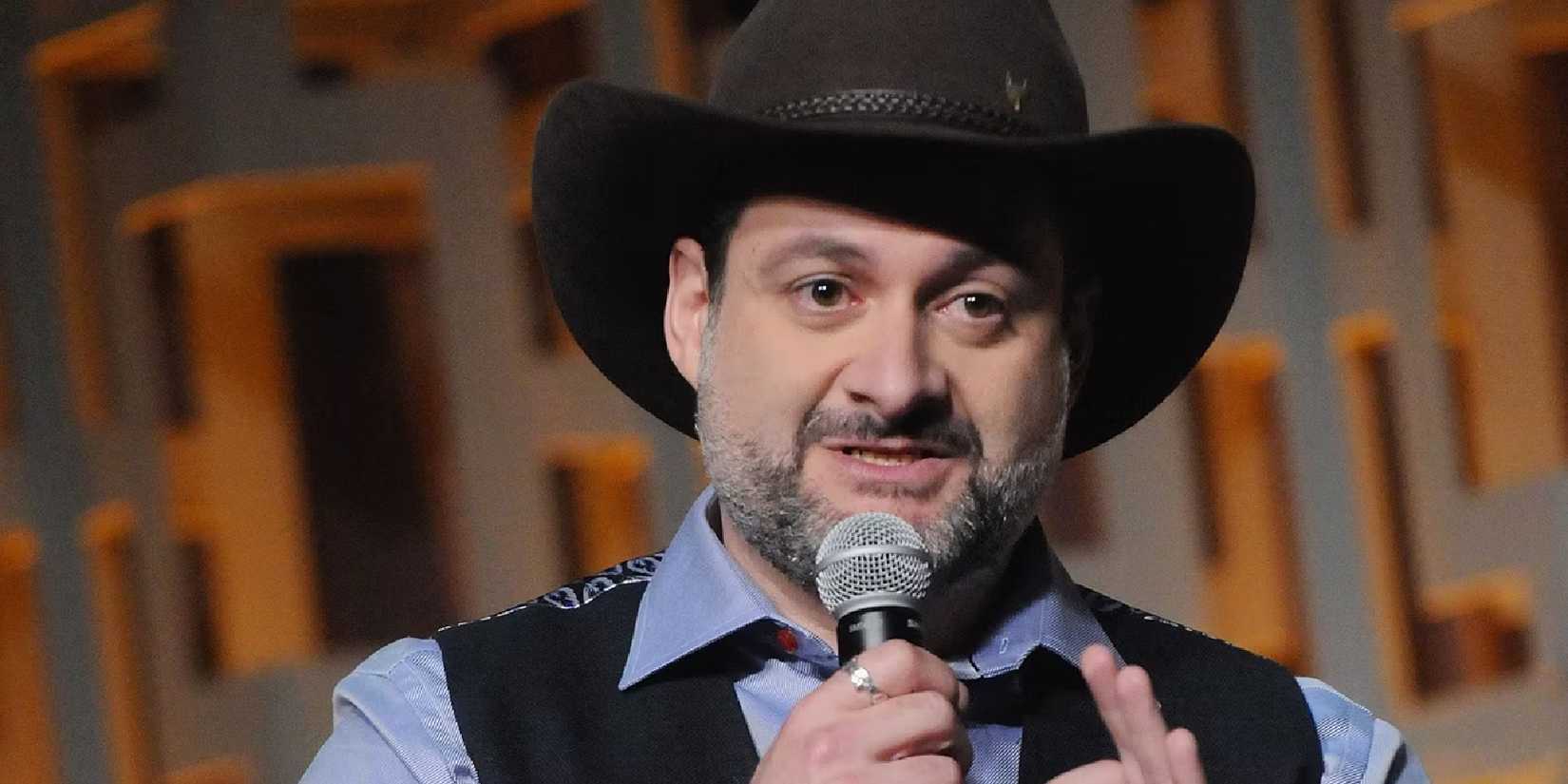 Dave Filoni speaks into a microphone