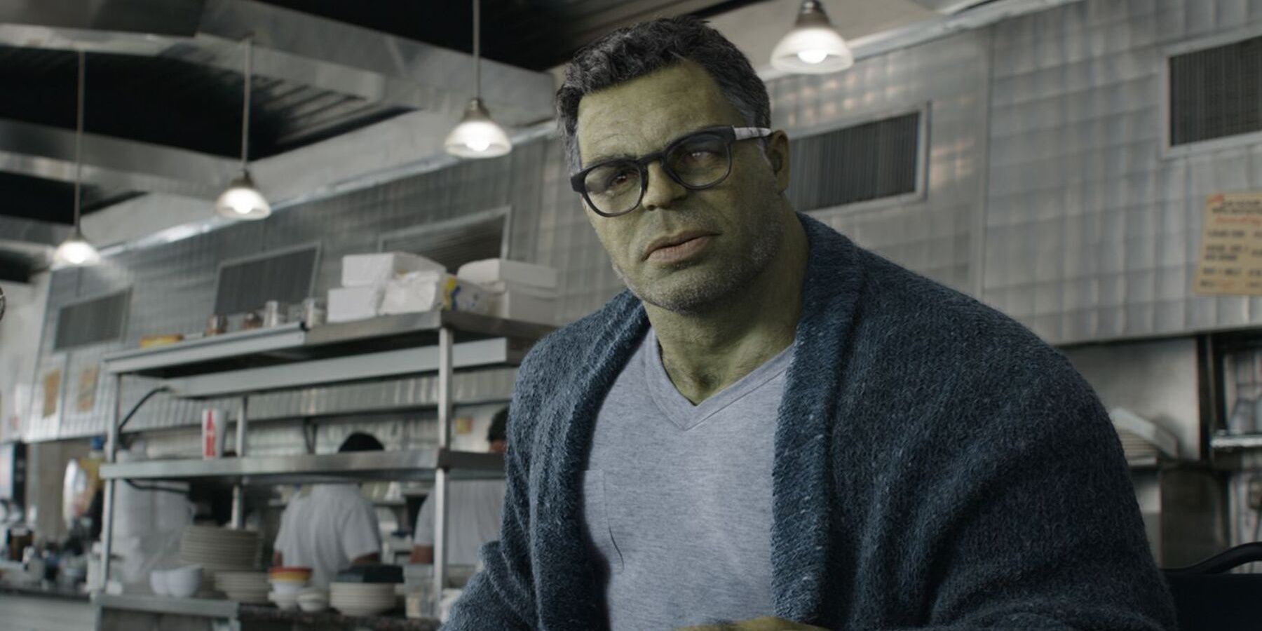Smart Hulk sitting in a diner