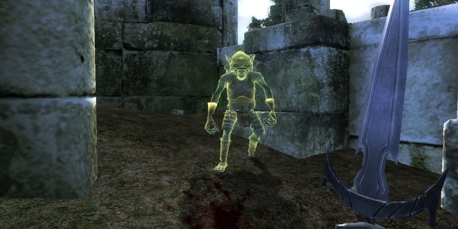 A glowing Goblin outside of Miscarcand's ruins; player wields a dagger