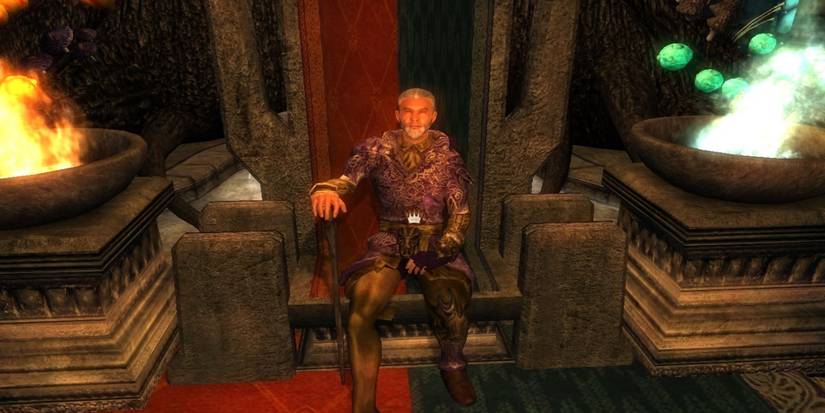 Elder Scrolls IV Oblivion - Sheogorath sitting on a throne beside two flames and in front of a giant tree