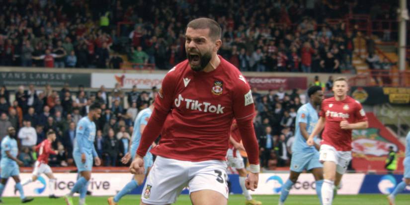 Wrexham's Elliot Lee celebrates promotion equalizaer vs Boreham Wood.