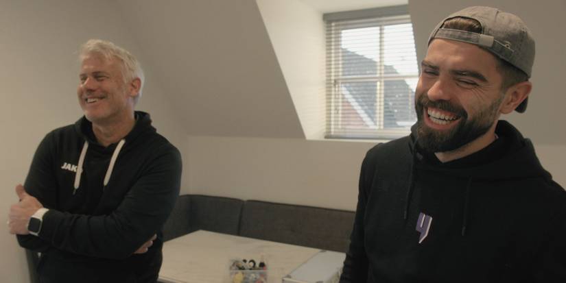 Former England international Rob Lee laughing with son and Wrexham midfielder Elliot Lee.