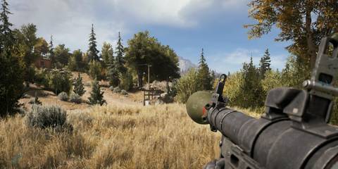 Far Cry 5 RPg 7 wielding in praire