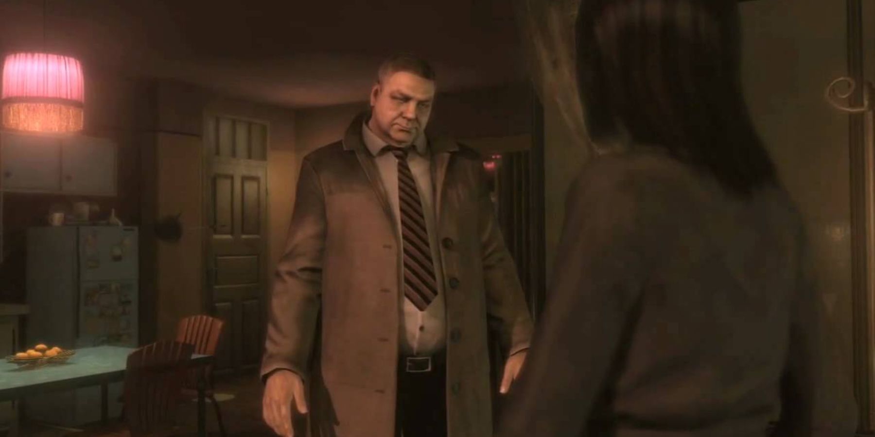 A man in a trench coat, shirt and tie standing in a house in front of a woman