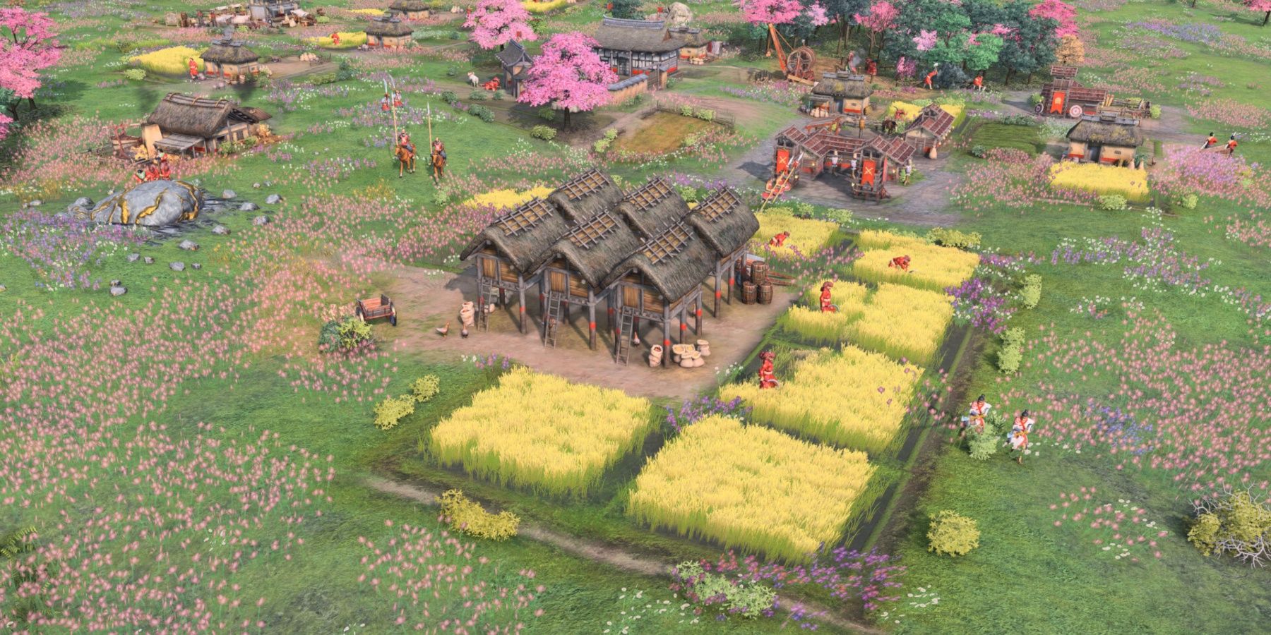 An overview of the Japanese Empire in Age of Empires 4, with cherry blossoms in the background