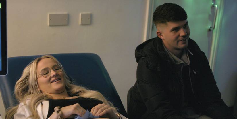 Wrexham's Jordan Davies with pregnant partner Kelsey at the doctor.