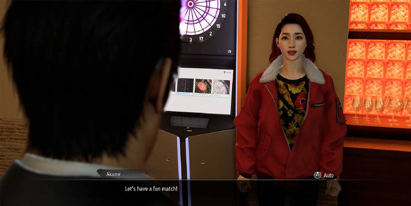 Challenging Akame to Darts in Like a Dragon Gaiden.