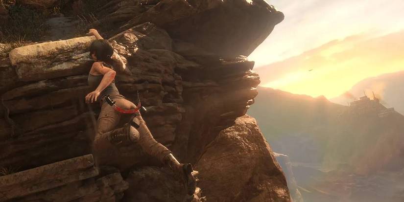 Lara Croft Hanging on a Cliff in Rise of the Tomb Raider