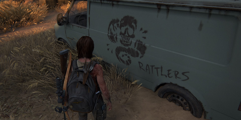 Ellie Looking at rattlers graffiti 