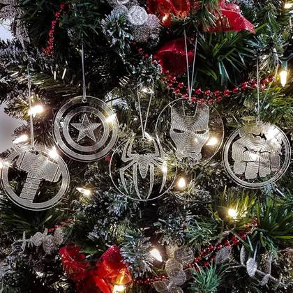 This image features five clear ornaments with the Avengers' symbols lasered on them.