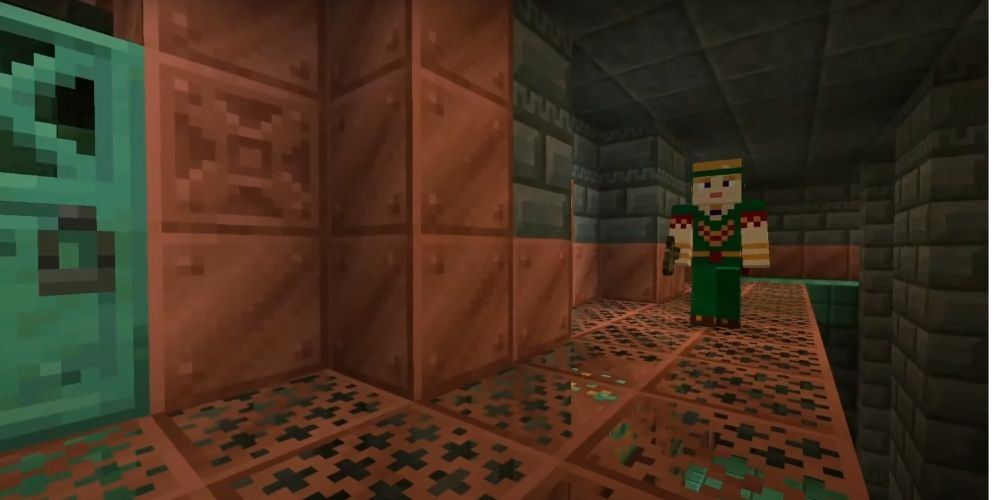 A minecraft character standing in a trial chamber