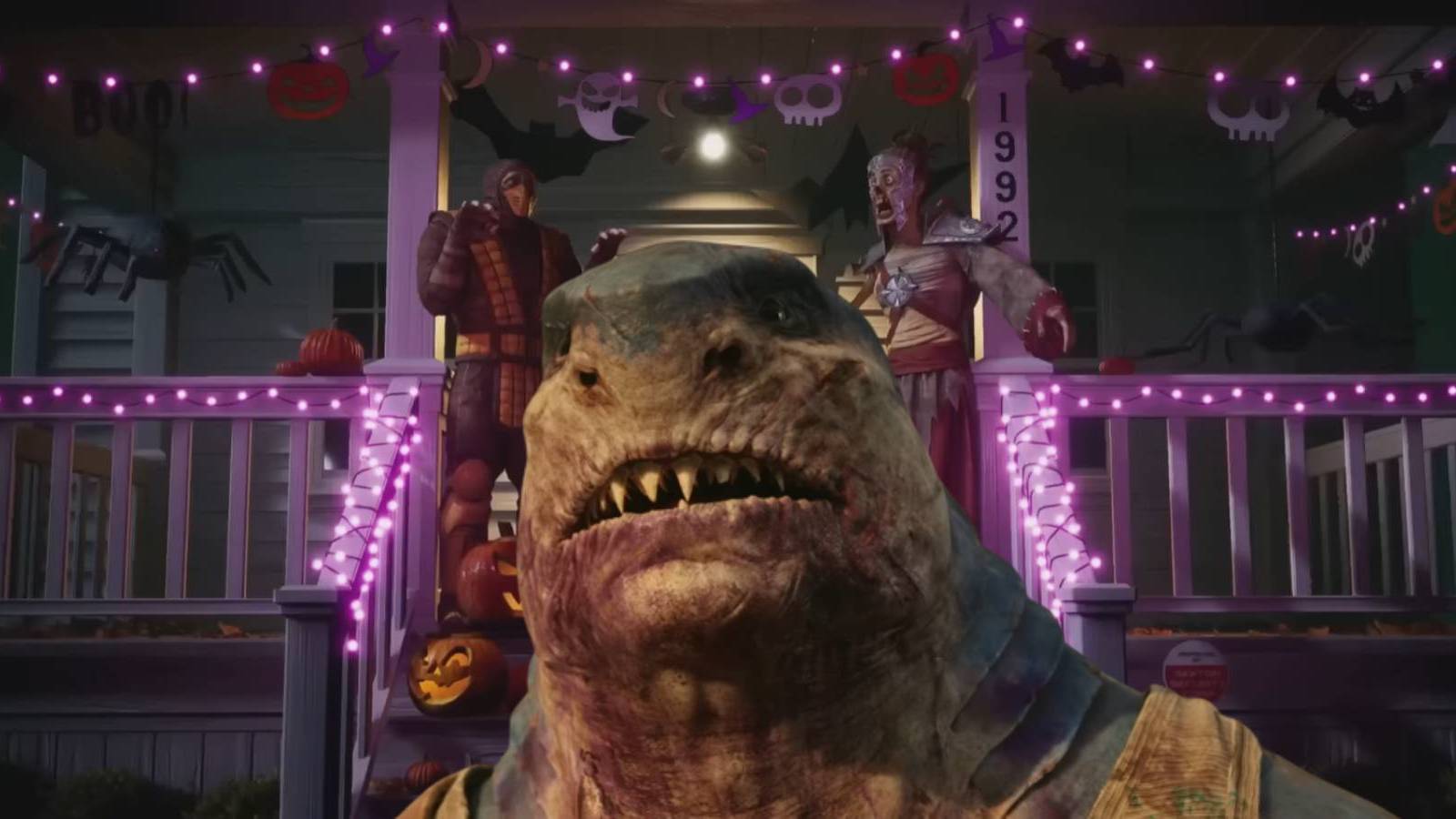 King Shark from Suicide Squad: Kill the Justice League over Mortal Kombat 1's Happy Halloween fatality