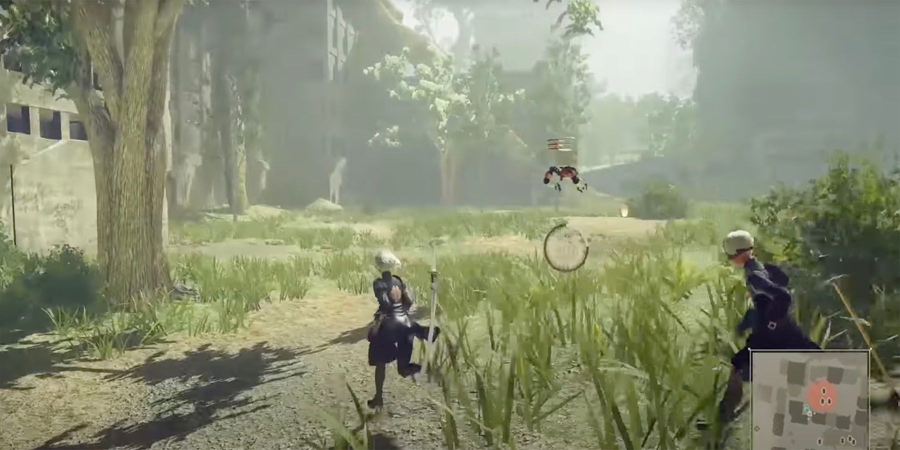2B and 9S running through a grassy area in NieR Automata