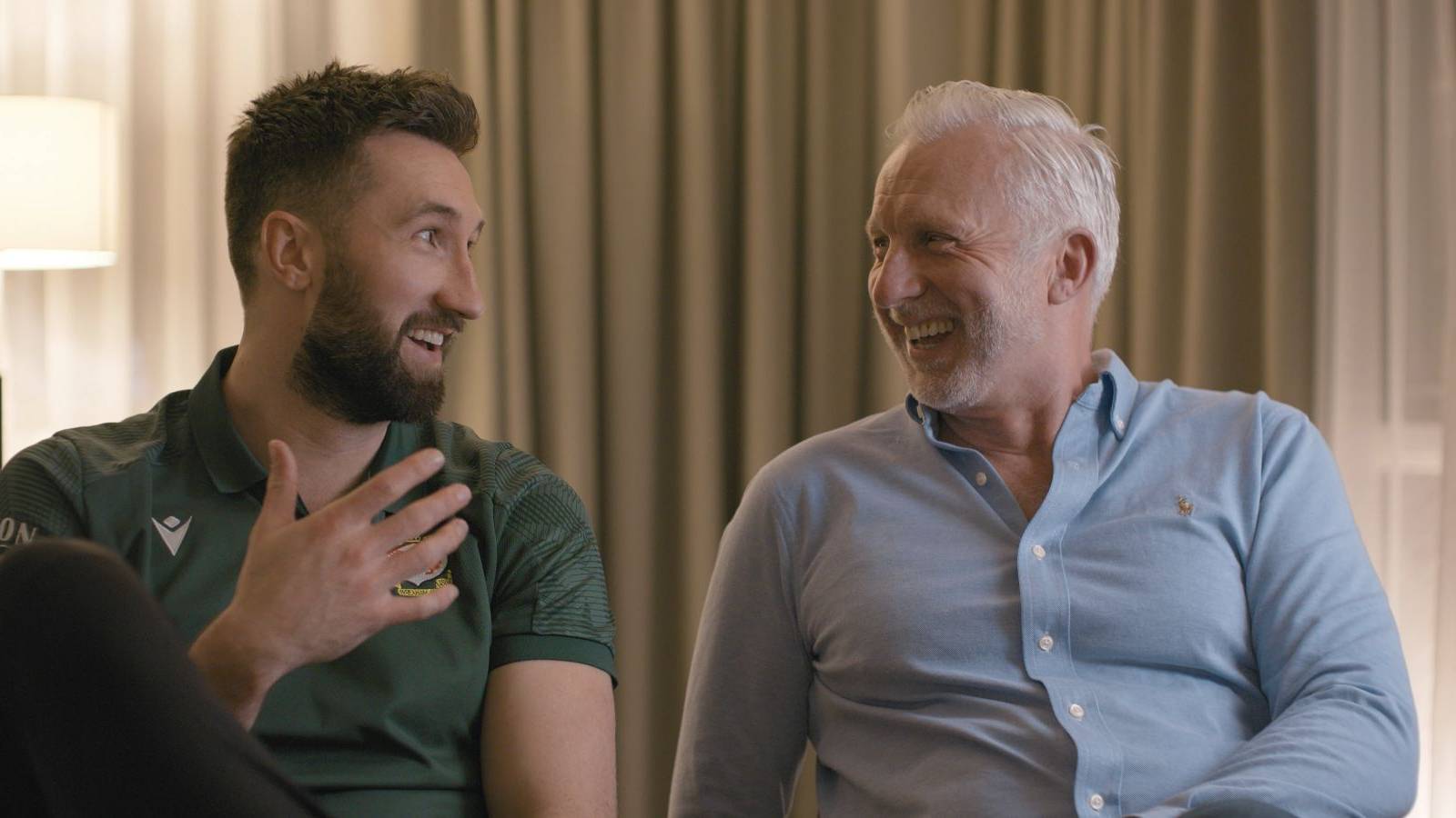 Wrexham striker Ollie Palmer smiling with gay father Andy Palmer